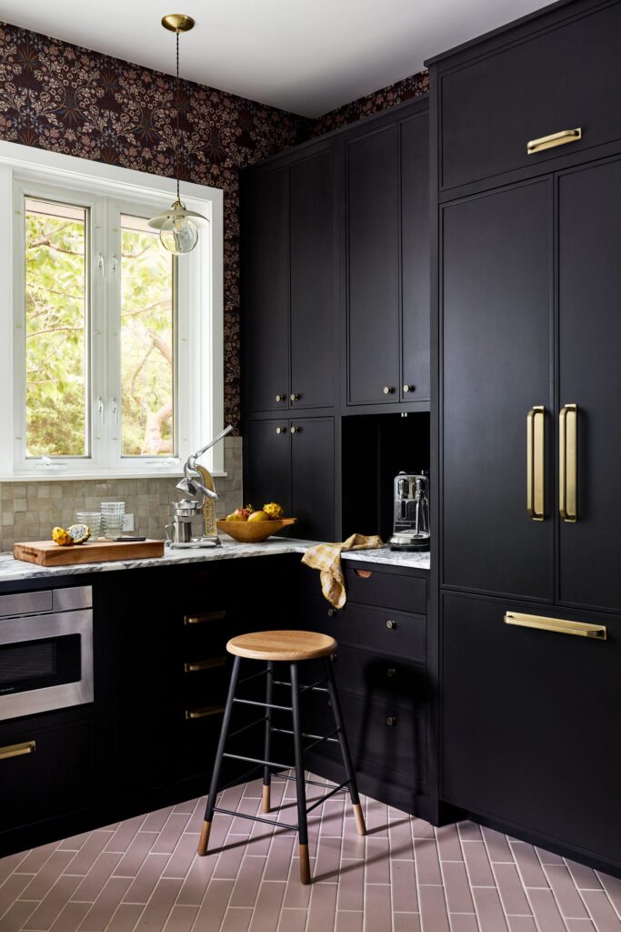 Interior decorator used dark and moody cabinetry in this in Annapolis home.