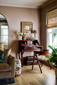 Elegant timeless interior design with antique furniture, layered natural textures, warm neutral colors, and classic styling that creates a home designed to last for generations.